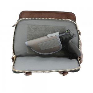 This concealed carry purse features ambidextrous access with a zippered three-sided pocket located on the front of the bag.
